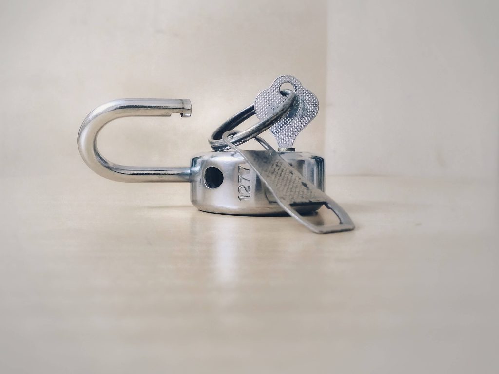open padlock with keys